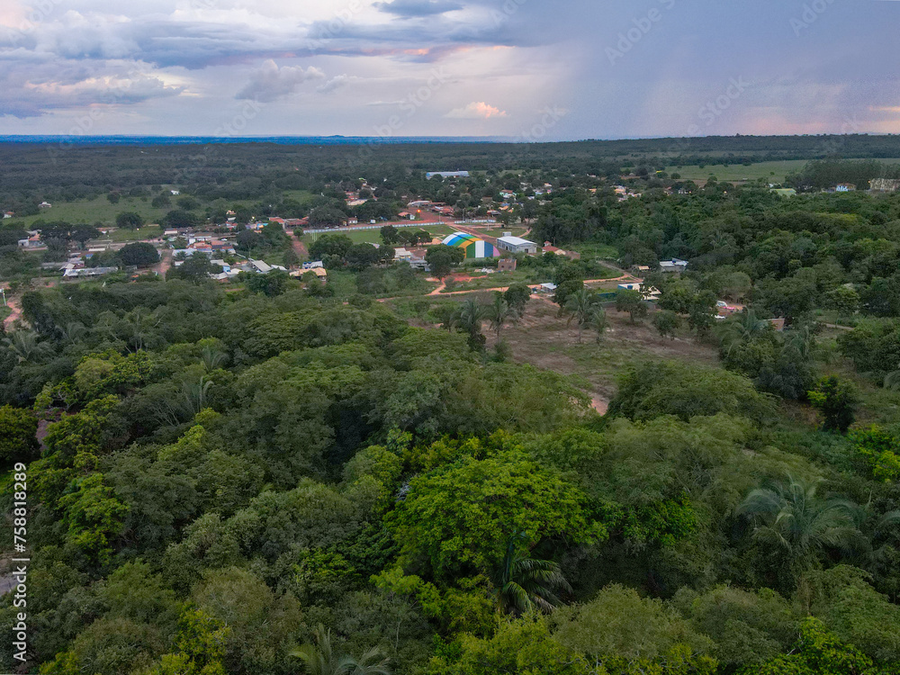 Aerial landscape of rainforest and village during summer in Nobres Bom Jardim Mato Grosso