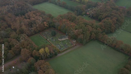 Aerial view of church with cemetery at autumnm The Netherlands photo