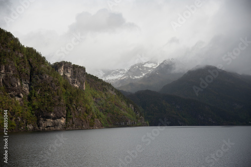 snow on the mountains in fjords