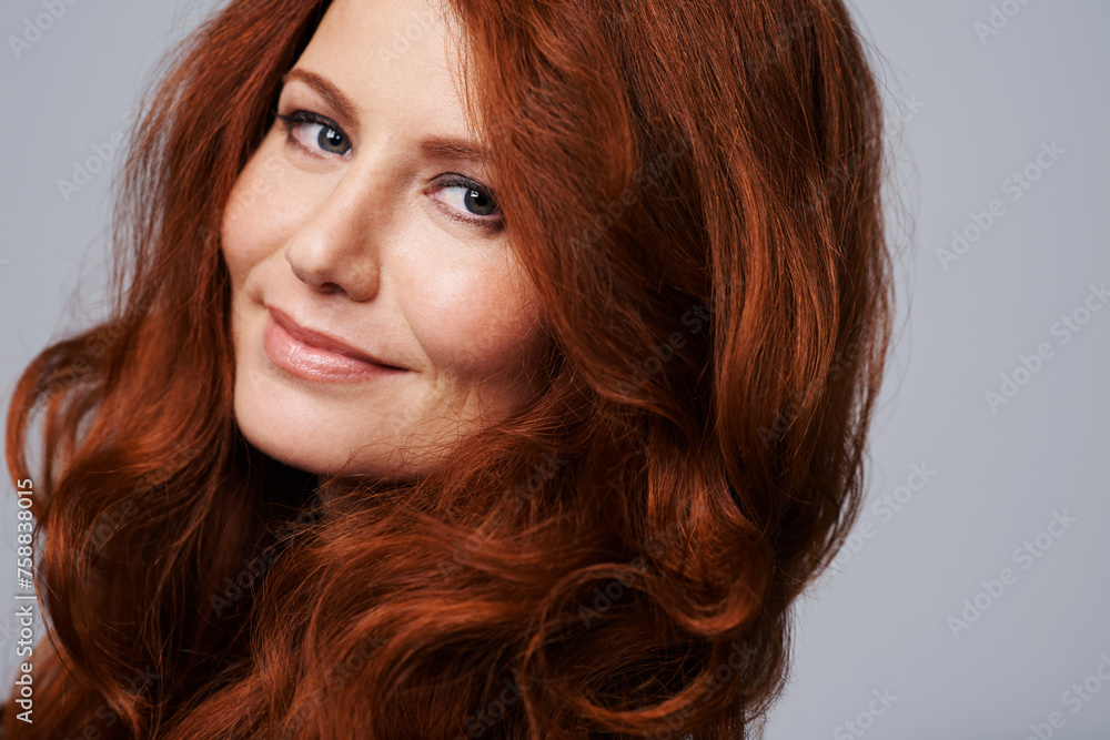 Portrait, beauty and hair with woman in studio isolated on white background for natural wellness. Face, skincare and haircare with confident mature model at spa for antiaging dermatology treatment