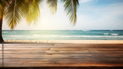 Wooden surface on background of the sea, beach and palm trees, blurred background