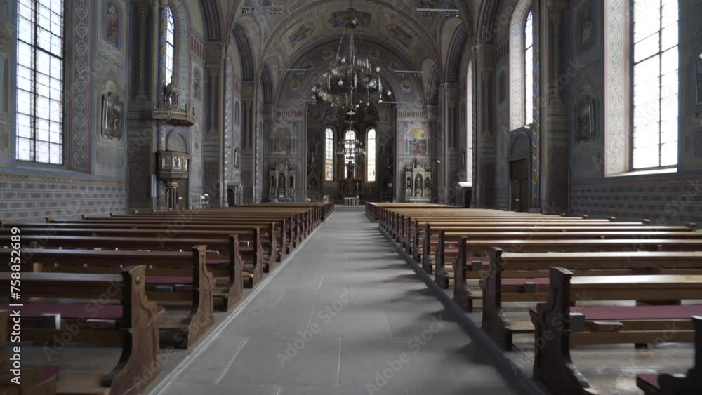 Wooden Benches In The Interior Of The Catholic Church Wooden Benches In The Interior Of The Catholic Church