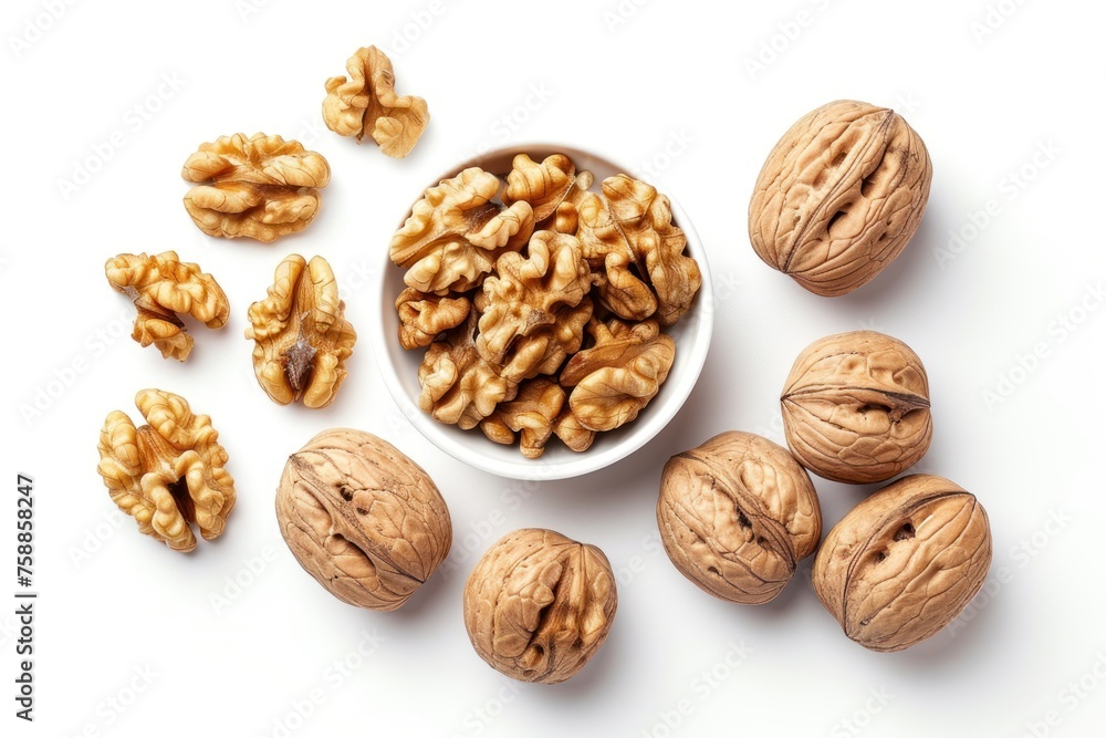 Walnut kernels and whole walnuts on white background Walnut kernels and whole walnuts on white background