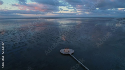 Aerial view of art object (De streken) with Oerol in Waddenzee during sunrise, Terschelling, Netherlands photo