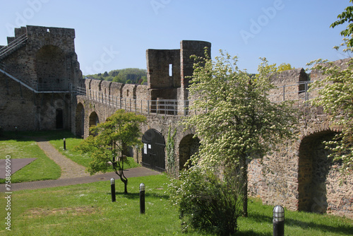 Inner side of the medieval city wall with round towers and wall-walk in the old town of Hillesheim, Eifel region in Germany
