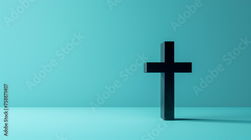 A black Christian cross on a blue wall. Good Friday design concept with copy space