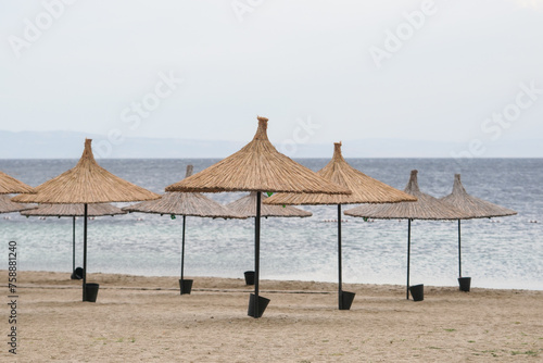 Sunbeds  Umbrellas and Hammocks in a beach