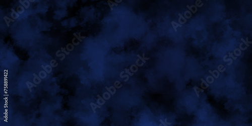 Abstract dark blue watercolor cloudiness, mist, or smog background. Dark navy blue sky with black background and blurred pattern. Vivid textured aquarelle painted art design background.