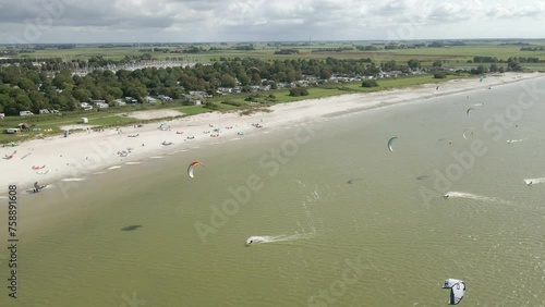 Aerial view of kitesurfing extreme sport with the wind at lake, Netherlands
