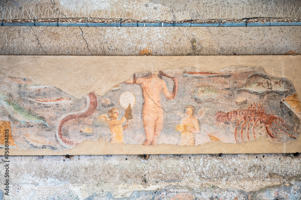 Colorful ruins of decorative roman fresco in Ancient Ostia
