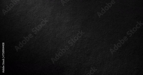 Texture of velvet black paper. Surface of black rough paper, slowly rotating. Use for background and texture.