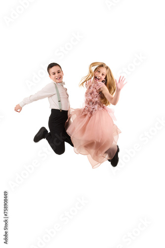 Jumping little girl and boy on white background