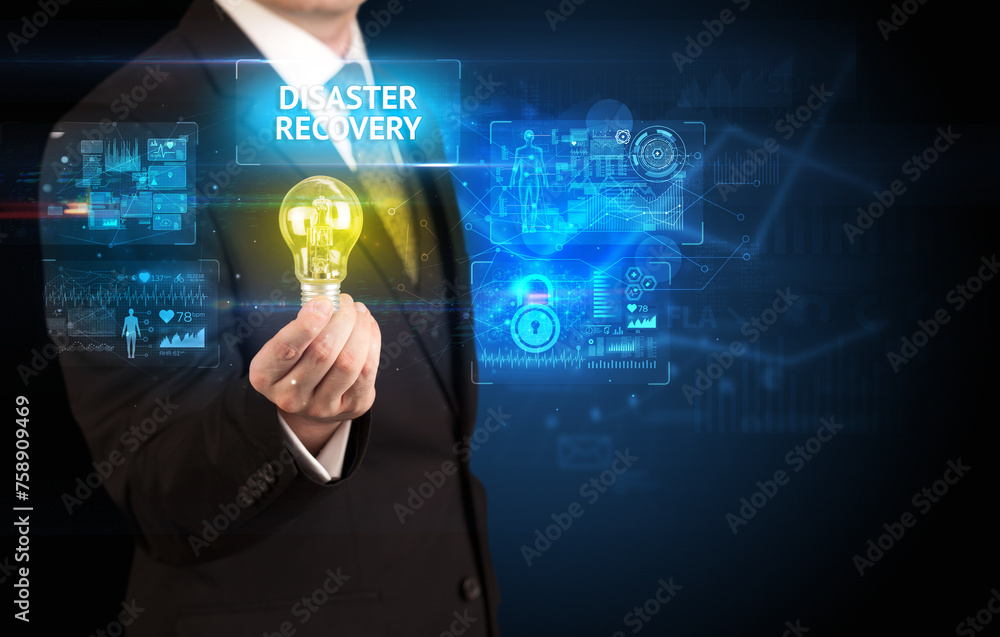 Obraz premium Businessman holding a light bulb, online security concept