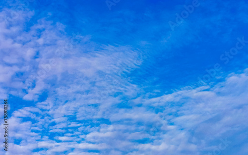 Blue sky with chemical chemtrails cumulus clouds scalar waves sky