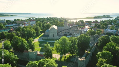 Aerial 4K video from drone to Haapsalu Castle in the background the town of Haapsalu and the Baltic Sea coast. Haapsalu, Estonia, Baltic States, Europe photo