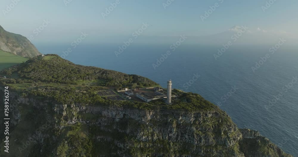 Aerial view of Sao Jorge Island with Farol dos Rosais lighthouse, Azores, Portugal. Aerial view of Sao Jorge Island with Farol dos Rosais lighthouse, Azores, Portugal.