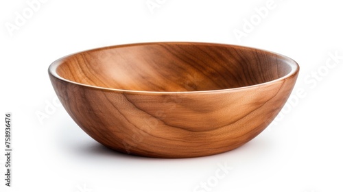 A simple wooden bowl placed on a white surface. Suitable for food and kitchen-related designs