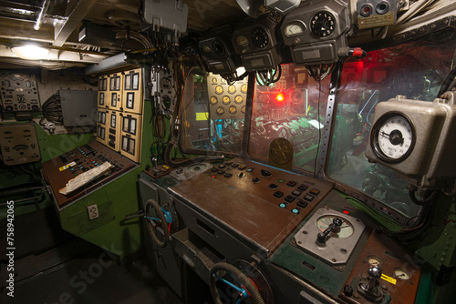 Interior of old battle ship's engine room control compartment