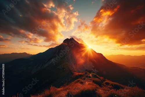 Beautiful sunset over a mountain with lush green grass, suitable for nature and landscape backgrounds
