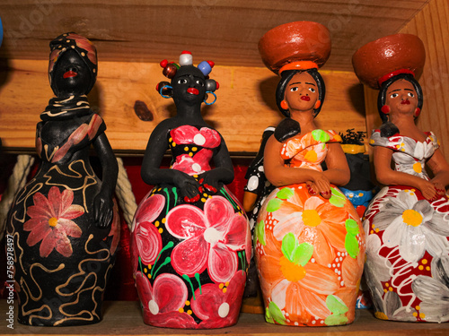 Clay and colorful dolls, typical of northeastern Brazil, are souvenirs for sale to tourists at the Central Market in Fortaleza, Ceará.