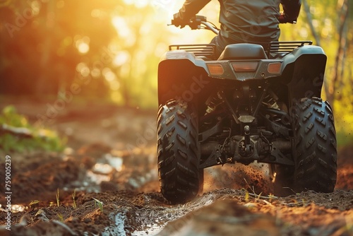 A man riding an atv on a dirt road