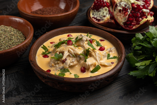 Creamy chicken curry with pomegranate and parsley