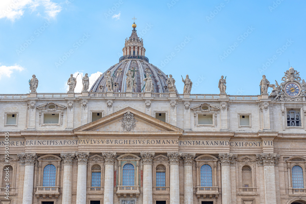 symmetrically framed front and central facade of the basilica of st peter in the vatican with details of the columns and windows