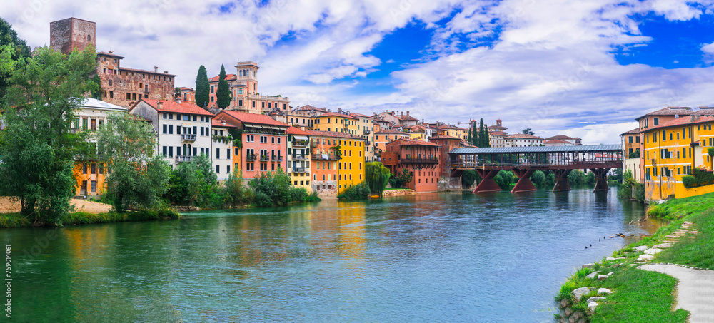 Beautiful medieval towns of Italy -picturesque Bassano del Grappa .Scenic view with famous bridge. Vicenza province, region of Veneto. - obrazy, fototapety, plakaty 