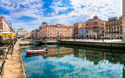 Fototapeta Naklejka Na Ścianę i Meble -  Landmarks and beautiful places (cities) of northern Italy - elegant Trieste town with charming streets and canals