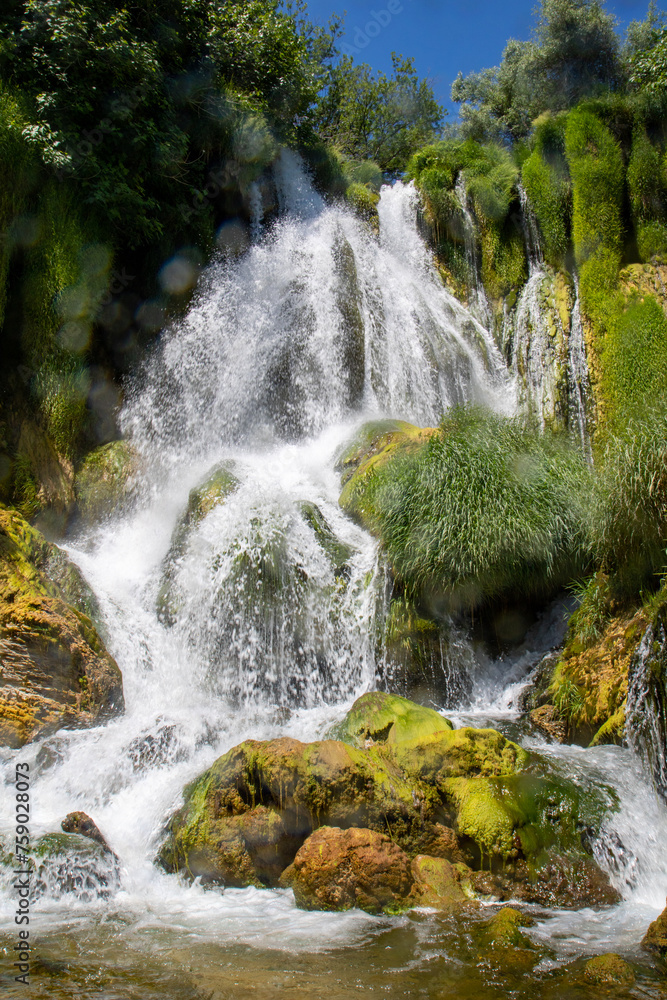 Obraz premium Vodopad Kravica, Kravice waterfall, a large tufa cascade on the Trebižat River, in the karstic heartland of Herzegovina in Bosnia and Herzegovina