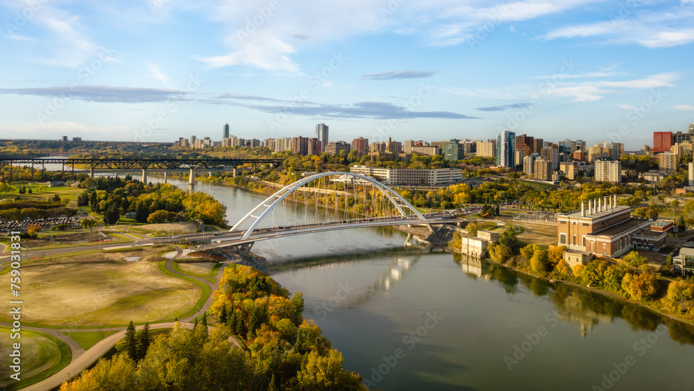 Bridge over the river with city in background. Edmonton, Alberta, Canada - obrazy, fototapety, plakaty 