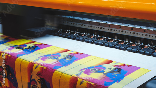 Konstfotografi A machine is printing a series of colorful images, including a portrait of a woman
