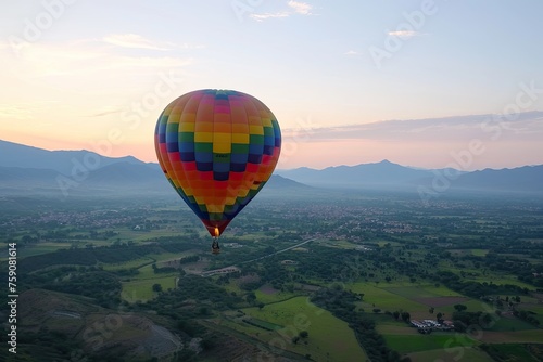 Hot air balloon ride in the blue sky of sunrise time