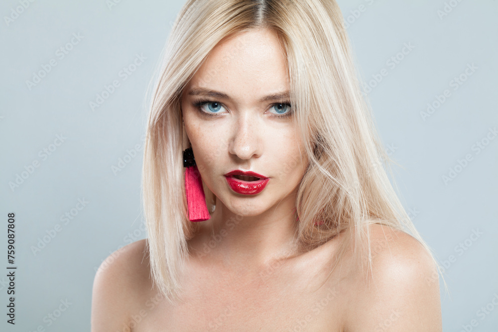 Attractive blonde model woman portrait. Facial treatment, cosmetology, skin care concept Attractive blonde model woman portrait. Facial treatment, cosmetology, skin care concept
