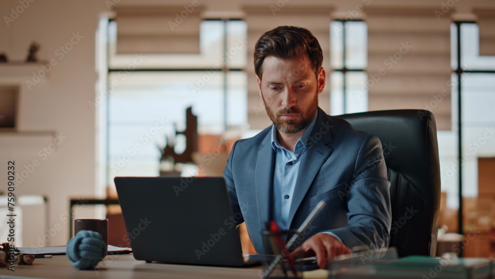 Angry director picking phone up at office work desk closeup. Man boss yelling Angry director picking phone up at office work desk closeup. Man boss yelling