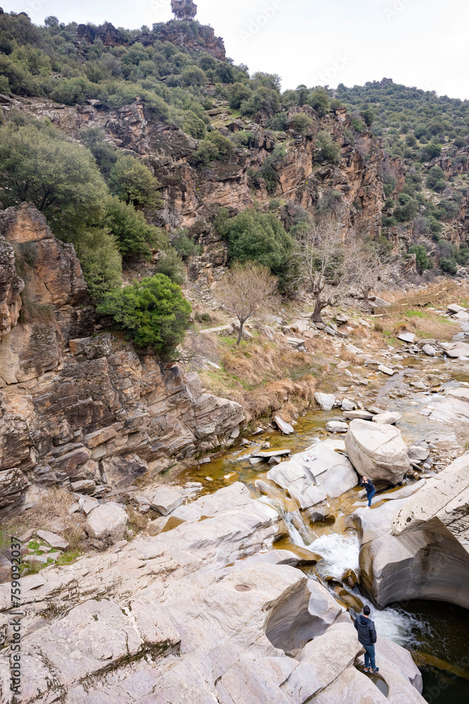 Tasyaran canyon, which attracts attention with its rock shapes similar to Antelope canyon in Arizona, offers a magnificent view to its visitors. Canyon view and stream at sunset. Usak, Turkey.