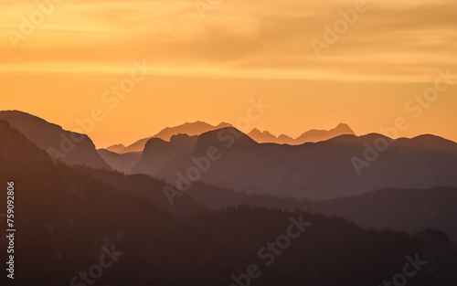 Mountain layers in warm evening light during sunset