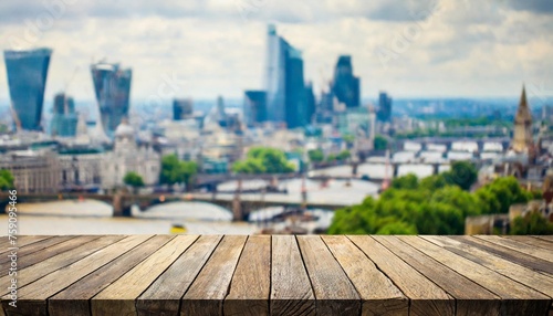 the empty wooden table top with blur background of london