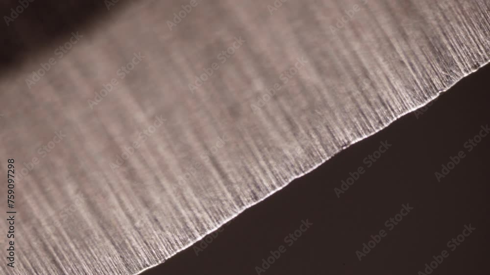 Scalpel under a microscope. 100x optical zoom. Detailed stainless steel