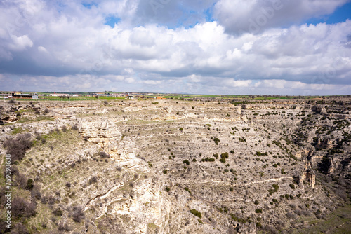 Ulubey Canyon is a nature park in the Ulubey and Karahallı of Usak, Turkey. The park provides suitable habitat for many species of animals and plants and is being developed as a centre for ecotourism.