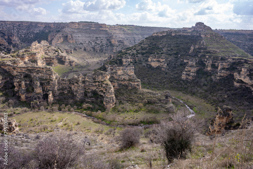 Ulubey Canyon is a nature park in the Ulubey and Karahallı of Usak, Turkey. The park provides suitable habitat for many species of animals and plants and is being developed as a centre for ecotourism.