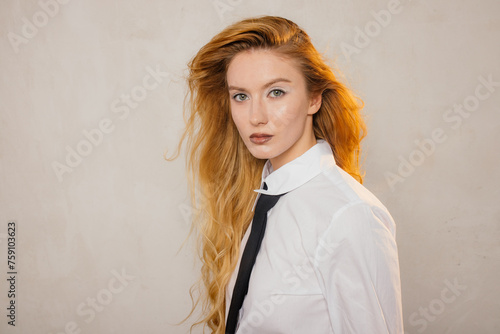 Woman in shirt with tie  photo