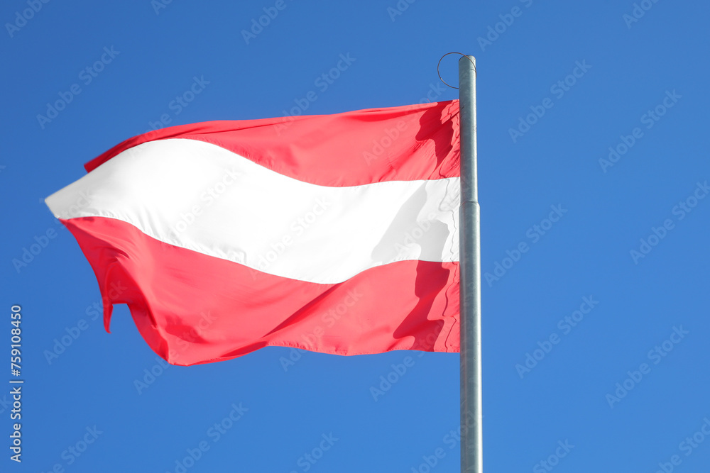 Austrian flag on sky background in Vienna Austria Austrian flag on sky background in Vienna Austria