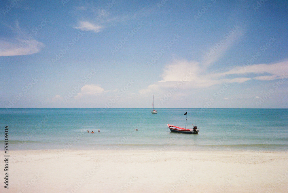 Boats on sandy beach. Tropical paradise.
