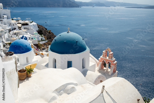 Famous blue dome church in Oia, Santorini. photo