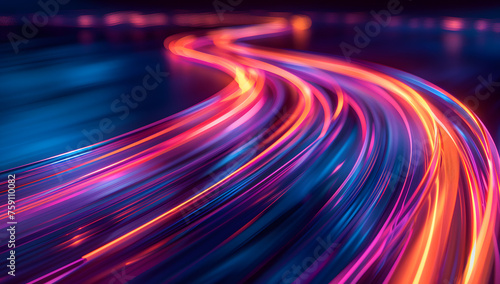 A vibrant light trail on a highway at night, showcasing a colorful mix of purple, violet, pink, red, and magenta hues, creating a mesmerizing visual effect with an electric feel