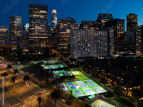 San Francisco Financial District and Pickleball courts at night photo