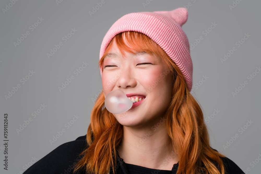Woman Smiling And Playing With A Gum Woman Smiling And Playing With A Gum