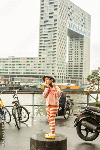 girl standing in front Pontsteiger building  photo