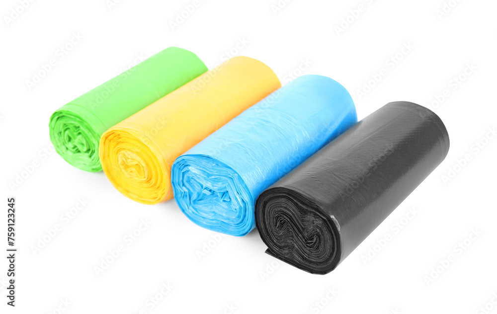 Rolls of colorful garbage bags isolated on white Rolls of colorful garbage bags isolated on white